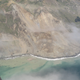 Image for article titled A Chunk Of The Prettiest Road In The World Has Been Buried In A Landslide